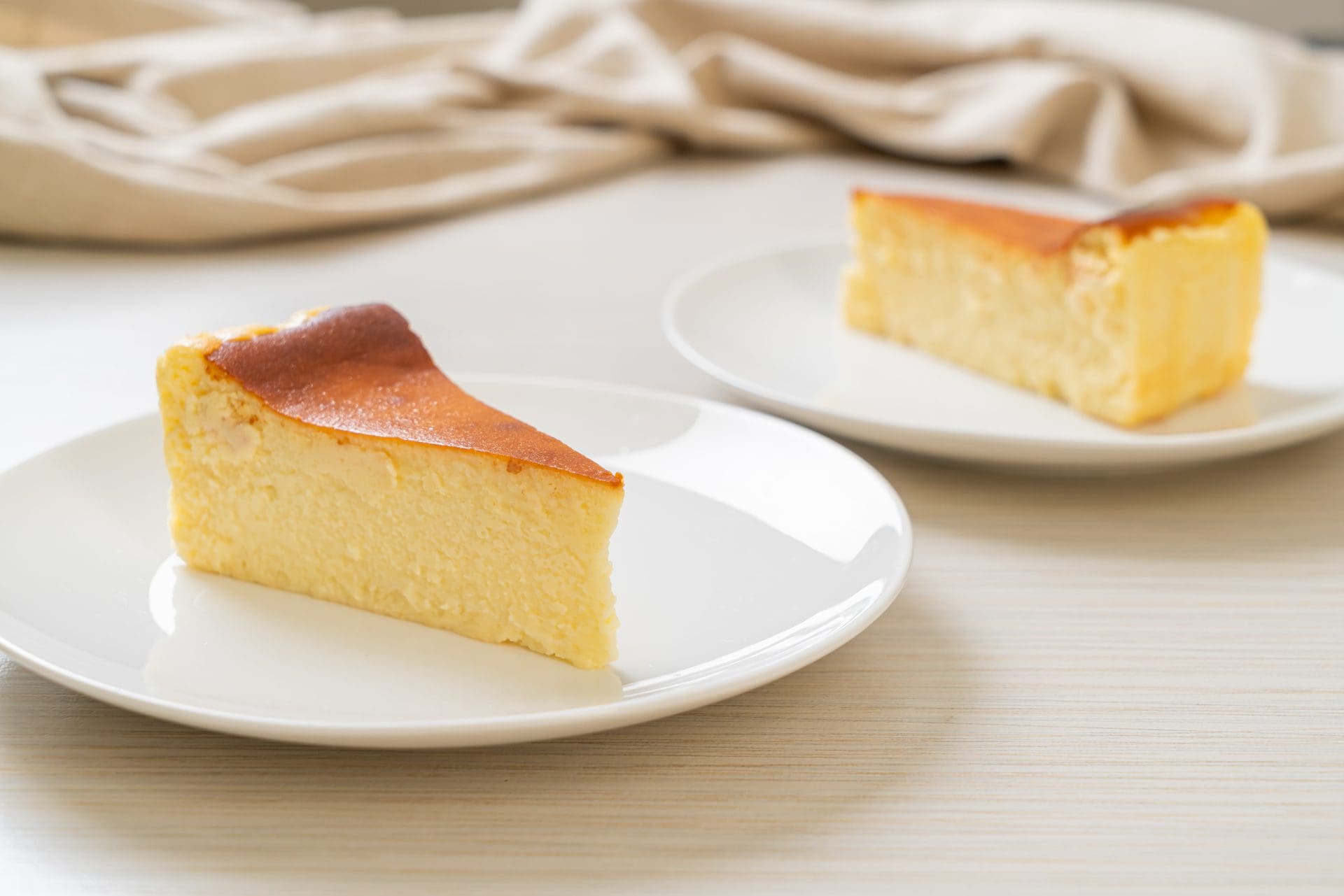 https://www.vecteezy.com/photo/2874115-homemade-burn-cheesecake-on-a-white-plate