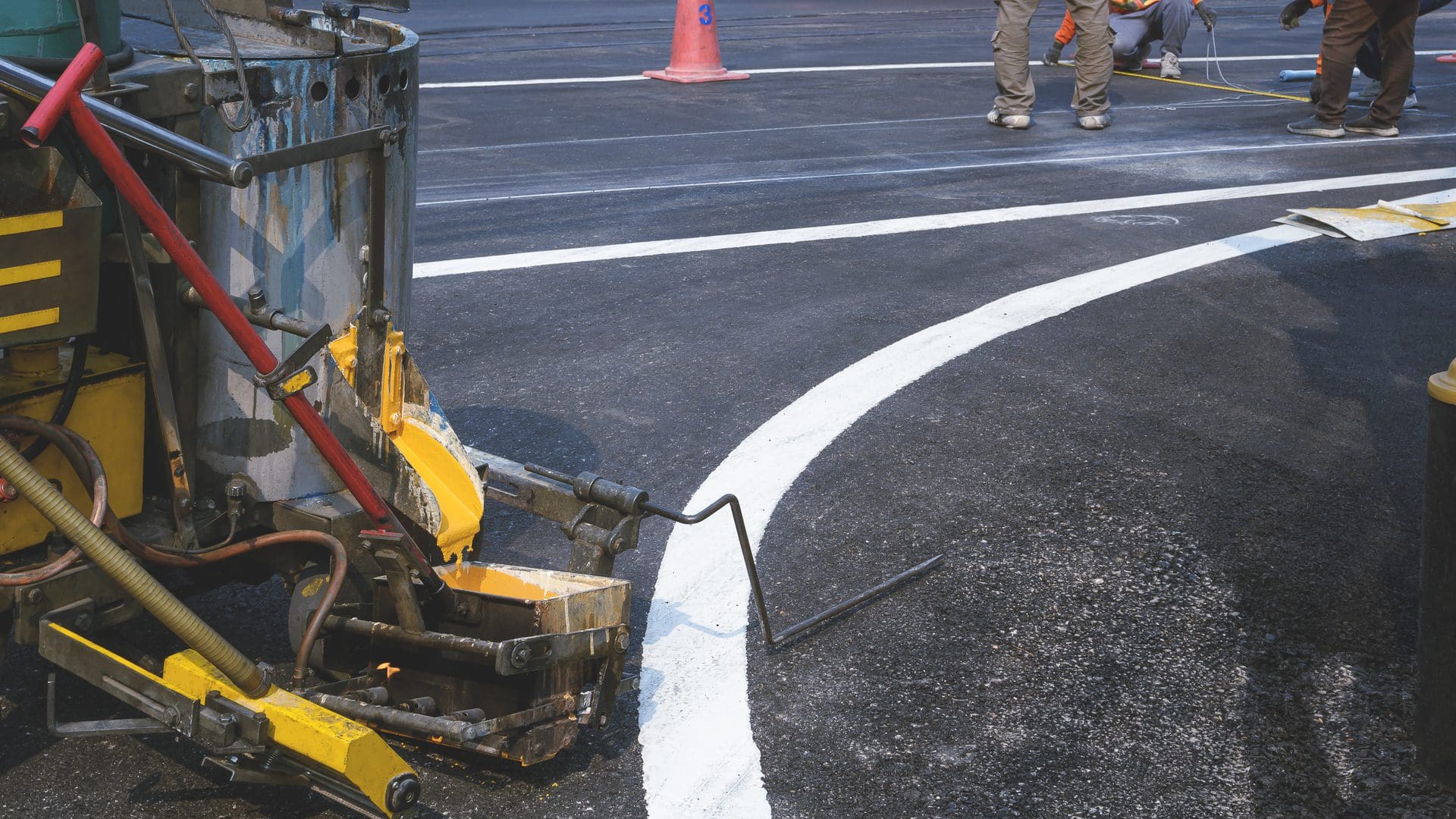 https://www.vecteezy.com/photo/6982796-close-up-image-of-thermoplastic-spray-marking-machine-with-blurred-background-of-road-workers-team-making-lines-for-painting-pedestrian-crosswalk-and-traffic-lines-on-asphalt-road