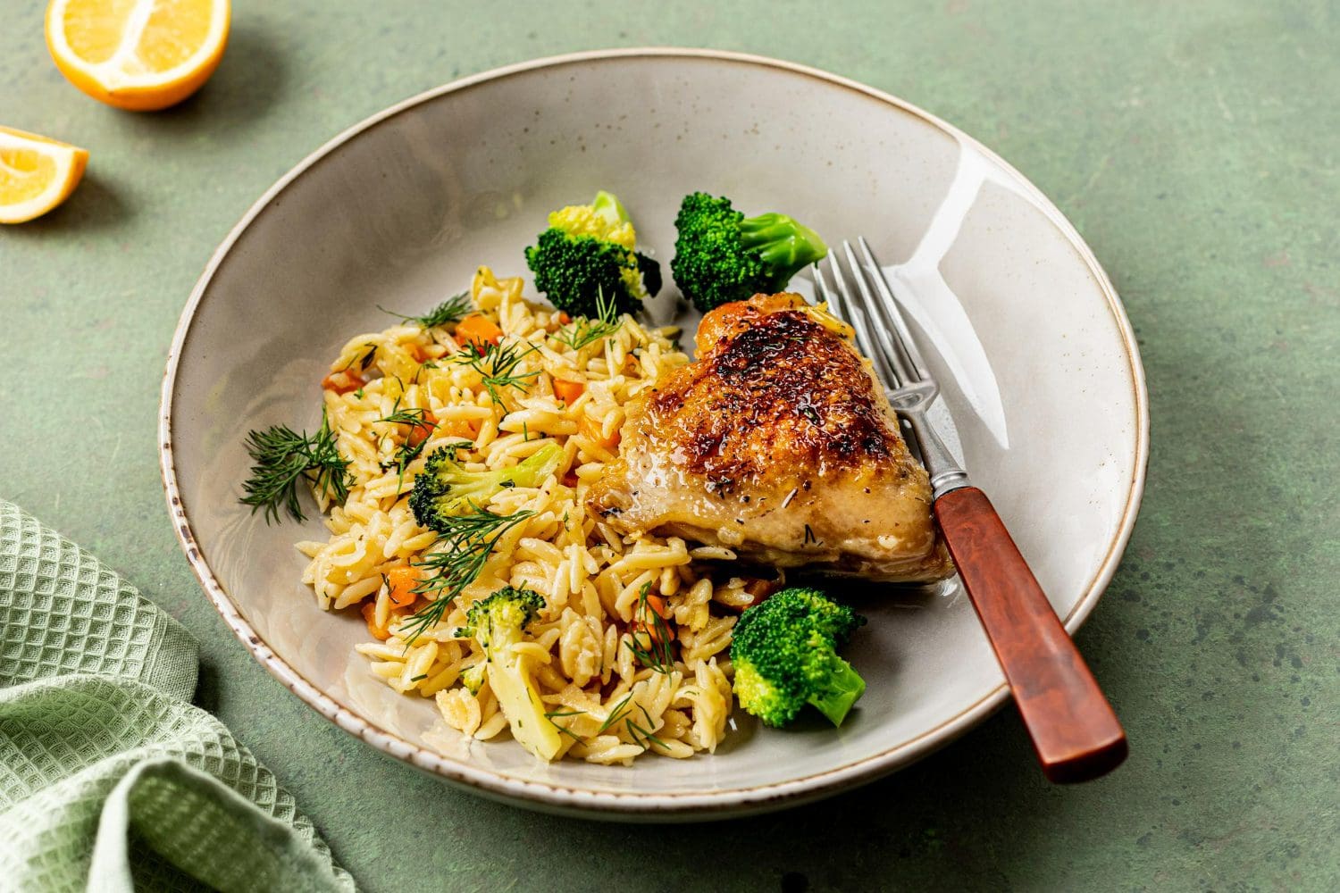 https://www.freepik.com/free-photo/bowl-with-chicken-orzo-pasta-with-vegetables-green-background_156748438.htm