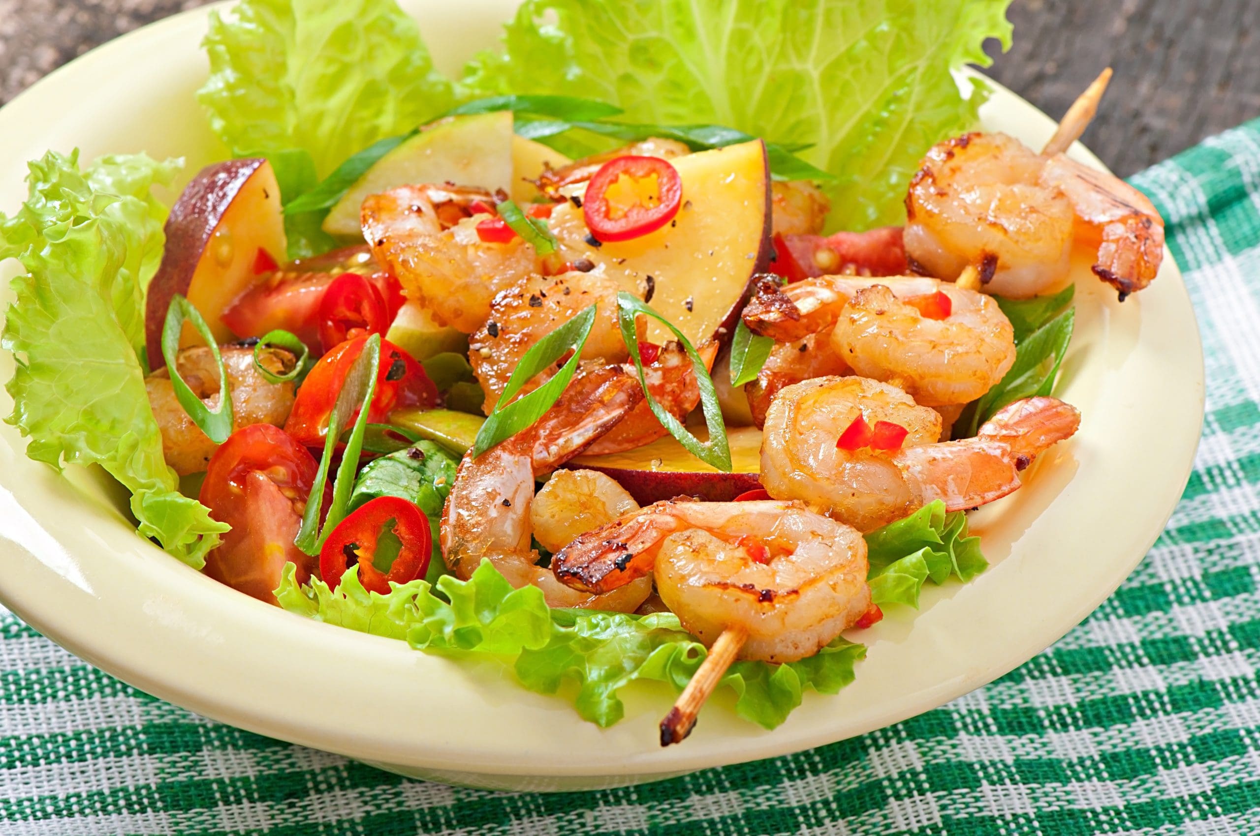 Shrimp salad with peaches, tomato, avocado and lettuce https://www.freepik.com/free-photo/shrimps-tortilla-tacos-open-face-wrap-with-fresh-vegetables-healthy-food-mexican-meal_6731688.htm#fromView=search&page=2&position=50&uuid=03fbf5ad-e08c-457b-ab47-920208f80165