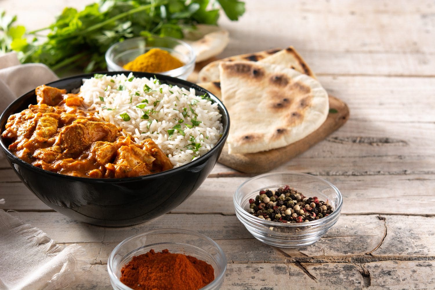 Tikka masala Freepik https://www.freepik.com/free-photo/indian-butter-chicken-black-bowl-wooden-table_23480634.htm#fromView=search&page=1&position=32&uuid=e4823174-d2d9-4ad6-99e9-b0b675ecd7b2