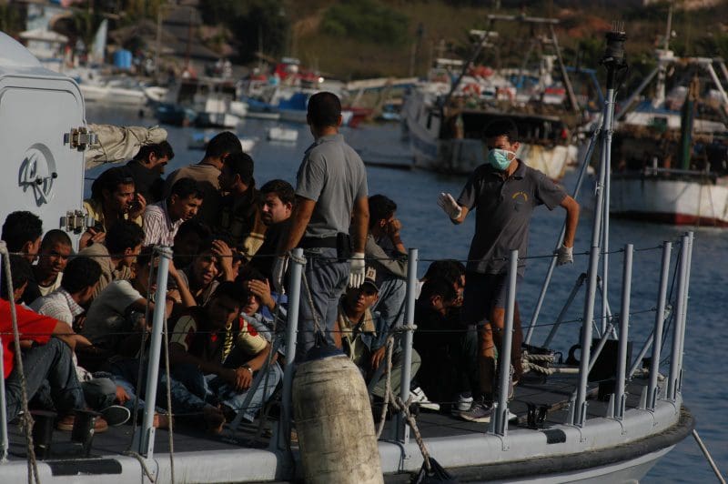 https://commons.wikimedia.org/wiki/File:Lampedusa_noborder_2007.jpg https://www.flickr.com/photos/noborder/2495544558/