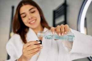https://www.freepik.com/free-photo/young-woman-pouring-mouth-wash_12302851.htm#fromView=search&page=2&position=23&uuid=3405e01e-f418-4c85-a9ed-0684cc82dc37&query=+oral+hygiene